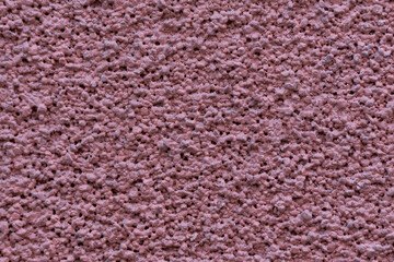 Abstract pink painted textured wall background.