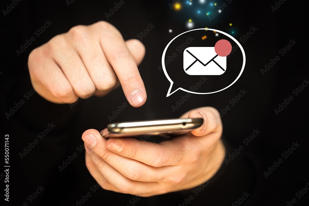 Poster Human hand using modern smartphone with email icon