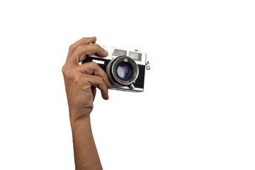 Male hand holding an old vintage camera with no background