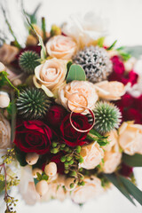Close-up of wedding rings on beautiful background