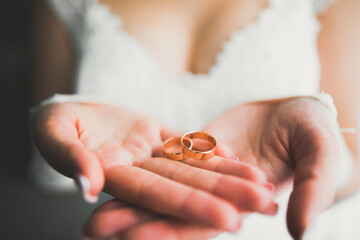 Luxury beautiful wedding rings in the hands