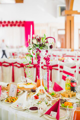 Interior of a restaurant prepared for wedding ceremony