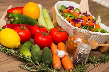Healthy and fresh salad in bowl with vegetables and fruit