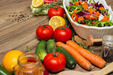 Healthy and fresh salad in bowl with vegetables and fruit