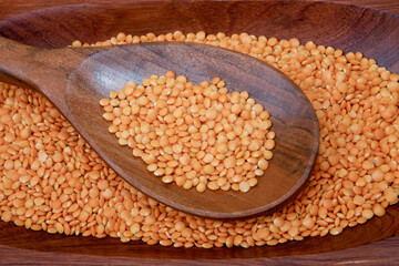 Pink lentil on wooden platter