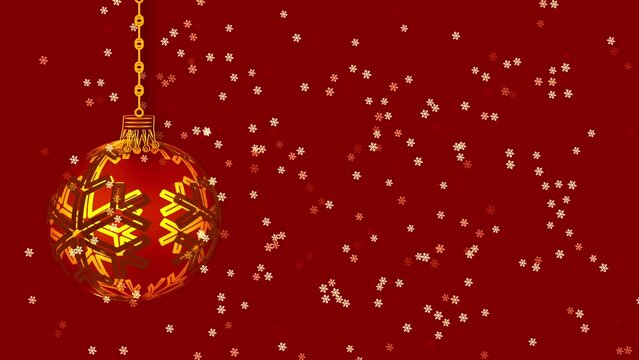 Golden Christmas bauble decoration on red background with snowflakes falling