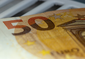Naklejka premium Euro banknote details in a macro shot. Closeup, selective focus. Europe finance background. Business symbol.