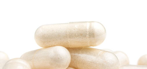 White medicine capsules, vitamin pills or drugs, medication treatment, health care concept,...