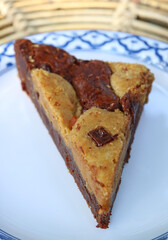Closeup of a slice of Delectable Chocolate Brookie on White Plate