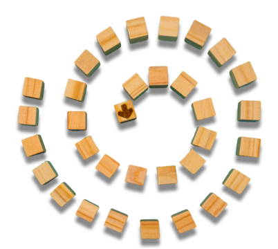 円を描きながら中心に向かう渦のウッドキューブの素材