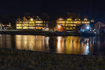 Fototapeta na wymiar Light and colors in Brønnøysund harbor area, Nordland county, Norway, Europe 