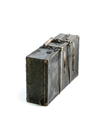 Old damaged suitcase isolated on white background