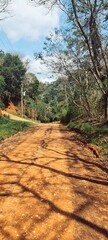 Very common dirt road in small cities in the interior of Brazil. Country living has its perks with no pollution and no heavy traffic.