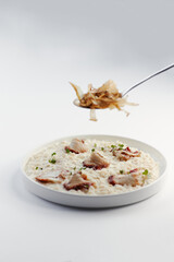 pearl barley porridge with parmesan, eel and tuna shavings