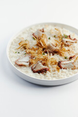 pearl barley porridge with parmesan, eel and tuna shavings