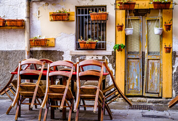 typical italian sidewalk cafe - restaurant