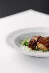 eel baked and laid on avocado