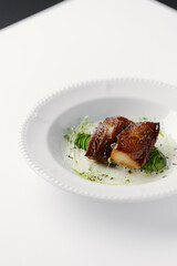 eel baked and laid on avocado