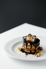 pumpkin pancakes poured with chocolate