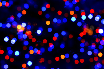 Textured festive background with blurred red-blue lights