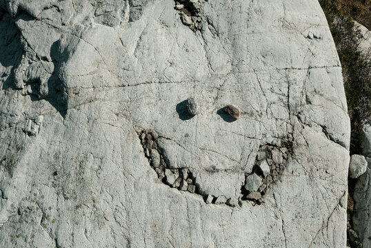 Smiley face on stone surface in&Acirc;&nbsp;Coast Mountains, Pemberton, British Columbia, Canada