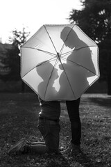 father kisses his wife's belly