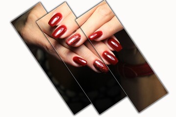 Closeup shot of beautiful female hands with a glamourous red manicure