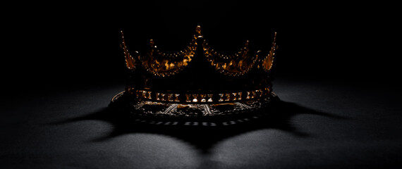 Fabulous golden crown of the king on a dark background. Panoramic view of the abstract fog. Mockup...