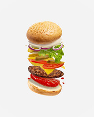Hamburger levitating on a white isolated background