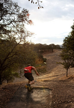 A man throws his driver during a match of frisbee golf