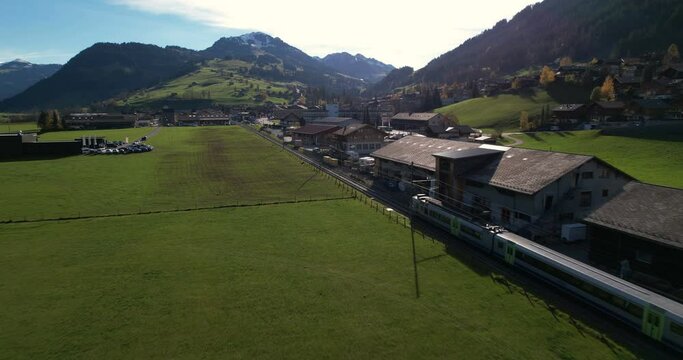 Train arriving in Zweisimmen - Aerial 4K