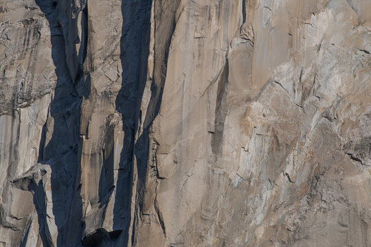 climbers on big wall in ocean of granite massive face El Capitan