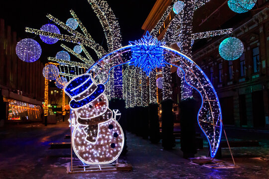 Christmas lights on a city streets. Christmas urban decorations