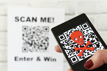 QR code scam concept - scanning a fraudulent QR code can lead to phishing websites or malware apps. 