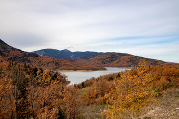 autumn landscape with mountains and lake