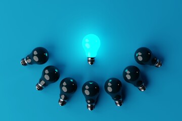 One lit blue light bulb in the background of other non-luminous light bulbs, blue background. The concept of the formation of ideas, creativity, problem solving. 3d render