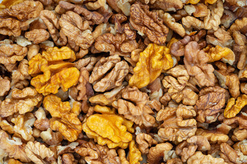 Walnut texture. Peeled kernels background.