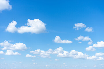 Obraz premium Blue sky background with small clouds.