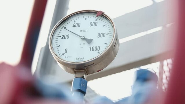 Oil pipeline with distribution pipes and gauges. Industrial Pressure gauge shows system pressure