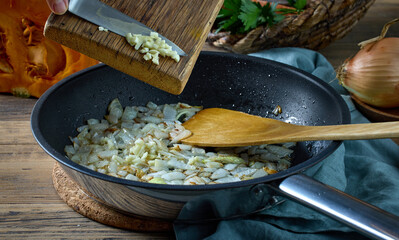 fresh chopped garlic is added to fried onions