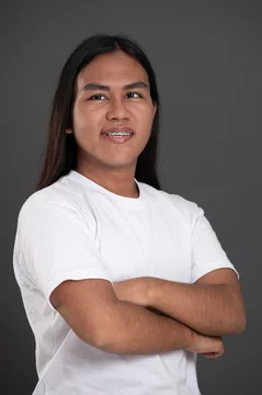 Smiling with teeth native american man