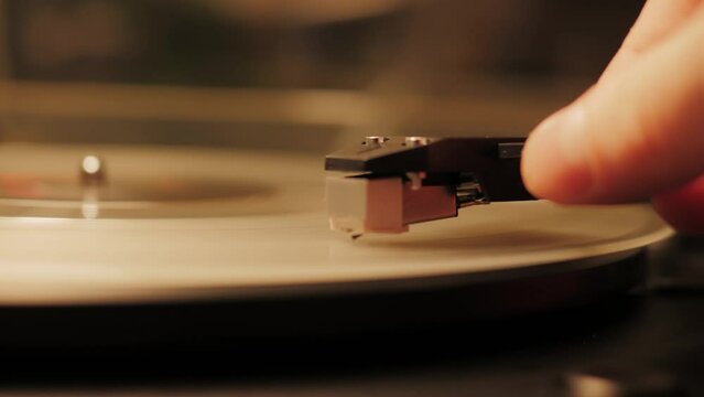 White Color LP Vinyl Disc Record Close-up Playing Music, Vintage old Vinil Player black phonograph spinning. Retro music player.