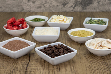 Variety of nutritious freeze dried supplements to add to any smoothie for a health boost