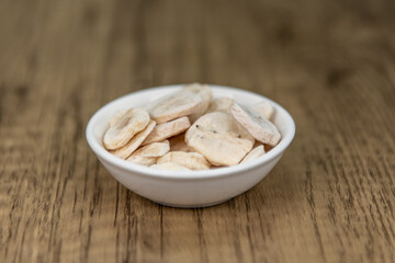 Freeze dried dehydrated banana slices can be ground up and added to a drink for a potassium boost