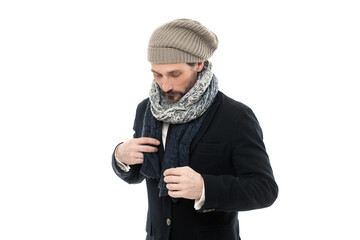 studio shot of guy wearing warm clothes and hat. guy winter fashion with warm clothes.