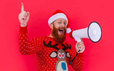 new year holiday. inspired man announcing in loudspeaker about new year sales. man at new year