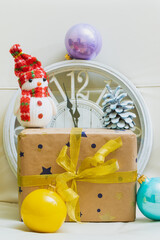 Christmas time and clock with Christmas decorations. New Year holidays