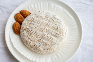 Taste of Provence, small round cheese Tome de Provence made from goat milk in Banon, Alpes-de-Haute-Provence, France