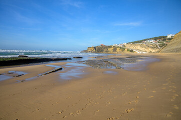 Magoito Beach, beautiful sandy beach on Sintra coast, Lisbon district, Portugal, part of Sintra-Cascais Natural Park with natural points of interest