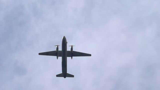 Flying twin -engine propeller liner. Super slow motion 1000 fps